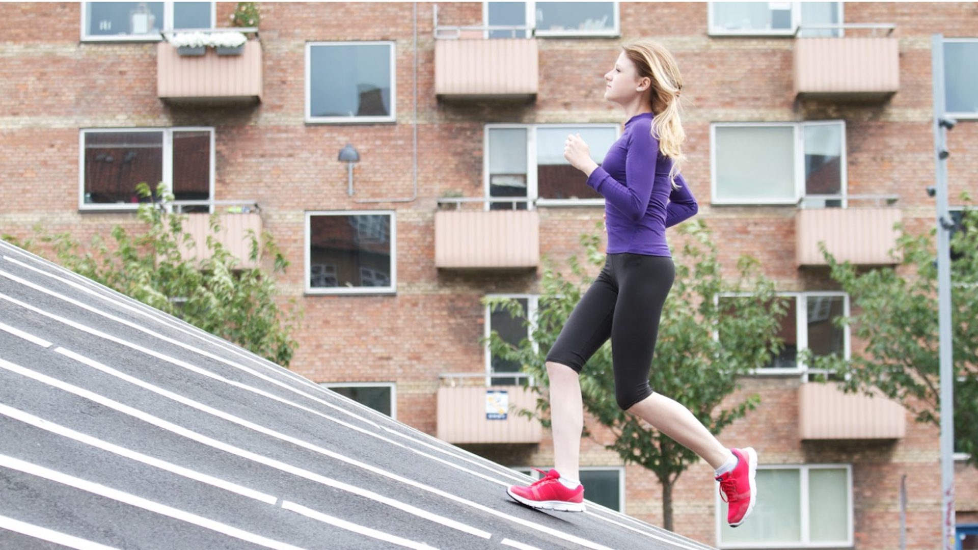 Girl running in city