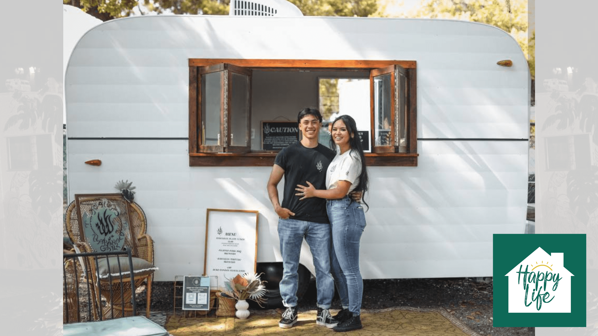 A newly married couple stand outside of their self-employed food truck.